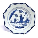 A RARE 18TH CENTURY BOW PORCELAIN OCTAGONAL PLATE painted in the 'Golfer and Caddy' pattern, 22cm