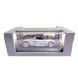 A DICKIE TOYS FOR PORSCHE 1/12 SCALE PORSCHE CARRERA GT silver, mint and boxed.