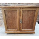 A MAHOGANY TABLE TOP CABINET with pair of doors opening to two short and three long drawers, with
