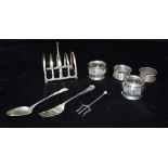 ASSORTED SILVER TABLEWARE ITEMS To include a silver toast rack hallmarked Birmingham 1926,