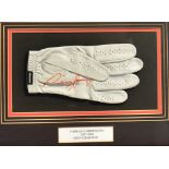 GOLF - A PRO SOFT LEATHER GLOVE signed in red ink 'Padraig Harrington', framed and glazed, overall