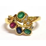 MULTI GEM & DIAMOND 18CT GOLD RING Foliate style head, bezel set with oval mixed cut emeralds, a