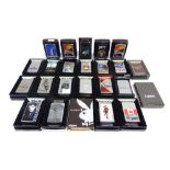 TWENTY-THREE ZIPPO LIGHTERS each boxed (two boxes lacking lids / covers).