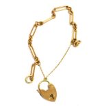9CT GOLD CURB LINK BRACELET 16cm long, 'fetter & curb' link bracelet, with heart shaped padlock