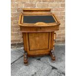 A VICTORIAN WLANUT DAVENPORT DESK WITH INLAID DECORATION with rear stationery compartment, slope