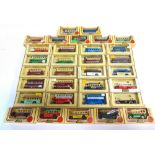 THIRTY-TWO LLEDO DIECAST MODEL BUSES all promotional issues, each mint or near mint and boxed.