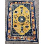 AN ANTIQUE CHINESE YELLOW GROUND CARPET the central field decorated with vases of flowers, 153cm x