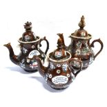 THREE MEASHAM BARGEWARE TEAPOTS each typically decorated, the largest 36cm high Condition Report :