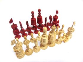 A 19TH CENTURY 'BARLEYCORN' PATTERN CARVED AND TURNED BONE CHESS SET natural white and stained