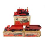THREE DINKY DIECAST MODEL VEHICLES comprising a No.511, Guy 4-Ton Lorry, brown cab and rear, black