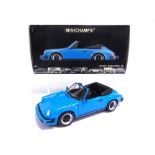 A 1/18 SCALE MINICHAMPS NO.100 063032, 1983 PORSCHE 911 CARRERA CABRIOLET blue, mint or near mint (