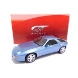 A 1/18 SCALE GT SPIRIT NO.GT006CS, 1992 PORSCHE 928 GTS light blue metallic, near mint (lacking rear