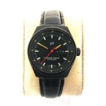 A PORSCHE DESIGN WRISTWATCH serial number 74374, the black face with baton hour markers and day/date