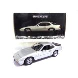 A 1/18 SCALE MINICHAMPS NO.100 062121, 1985 PORSCHE 924 silver, mint or near mint (model dusty