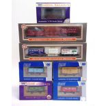 [OO GAUGE]. SEVEN LIMITED EDITION WAGONS BY DAPOL comprising a West Wales Wagon Works lime wagon and