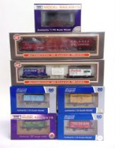 [OO GAUGE]. SEVEN LIMITED EDITION WAGONS BY DAPOL comprising a West Wales Wagon Works lime wagon and