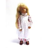 A SASHA GIRL DOLL with (replacement) long blonde hair, wearing a floral-printed cotton dress,