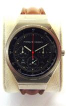 A PORSCHE DESIGN WRISTWATCH, BY I.W.C. serial number 2505057, the dark grey face with short baton