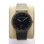 A PORSCHE DESIGN WRISTWATCH, BY I.W.C. serial number 2545255, the black face with short baton hour
