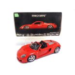 A 1/18 SCALE MINICHAMPS NO.100 062630, 2004 PORSCHE CARRERA GT red, very good condition (complete