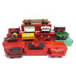 [O GAUGE]. TWELVE ASSORTED WAGONS comprising a no.2 Lumber Wagon; Shell Petrol Tank Wagon; Crane