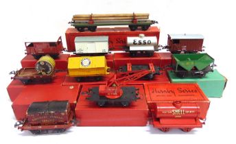 [O GAUGE]. TWELVE ASSORTED WAGONS comprising a no.2 Lumber Wagon; Shell Petrol Tank Wagon; Crane