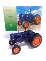 A 1/16 SCALE UNIVERSAL HOBBIES FORDSON MAJOR E27N dark blue and orange, mint or near mint, boxed.