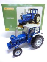 A 1/16 SCALE UNIVERSAL HOBBIES FORD 7600 blue and pale grey, mint or near mint, boxed.