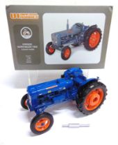 A 1/16 SCALE UNIVERSAL HOBBIES FORDSON SUPER MAJOR (1960), LAUNCH MODEL blue and orange, mint or