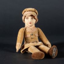 A NORAH WELLINGS A.T.S. GIRL DOLL in khaki service uniform, labelled to the left foot, 26cm high.