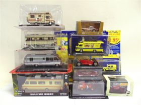 ASSORTED DIECAST MODEL VEHICLES including four motor homes, most mint or near mint and boxed or in