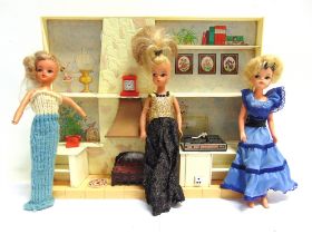 A SINDY COLLECTION comprising three dolls; clothing; and a quantity of accessories, including a