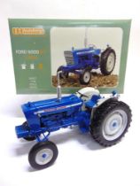 A 1/16 SCALE UNIVERSAL HOBBIES FORD 5000 6Y (1968) blue and pale grey, mint or near mint, boxed.