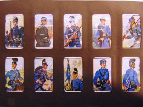 CIGARETTE CARDS - MILITARY, GERMAN ISSUES many of uniform interest (8 albums).