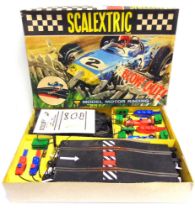 A SCALEXTRIC SET 40 comprising a No.C67, Lotus, red; No.C66, Cooper, blue; track and controllers,