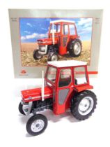 A 1/16 SCALE UNIVERSAL HOBBIES MASSEY FERGUSON 135 red and grey, mint or near mint, boxed.