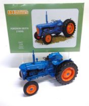 A 1/16 SCALE UNIVERSAL HOBBIES FORDSON DEXTA (1958) blue and orange, mint or near mint, boxed.