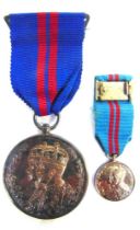 A DELHI DURBAR MEDAL, 1911 unnamed as issued, brooch-mounted for wearing; together with a