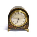 AN EARLY 20TH CENTURY CHINOISERIE MANTEL CLOCK the 8cm diameter silvered circular dial with black