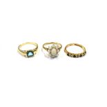 9CT GOLD GEM SET RINGS To include a white opal cabochon floral cluster, an octagonal step cut blue