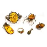 VARIOUS BALTIC AMBER & SILVER JEWELLERY To include a bangle set with an oval piece of amber approx