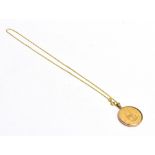 HALF KRUGERRAND ON 9CT GOLD CHAIN Spectacle set half krugerrand on 48cm long 9ct gold figaro link