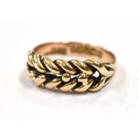 VICTORIAN 9CT GOLD KEEPER RING A plaited design, 'keeper' or guard ring worn to prevent more