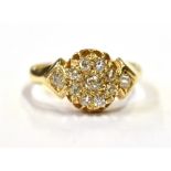 ESTATE CUT DIAMOND 18CT GOLD RING A belcher claw and grain set floral cluster head, set with old