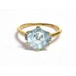 9CT GOLD & TORUS CUT TOPAZ RING A Glen Lehrer patented Torus cut hexagonal shaped blue topaz,