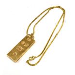 9CT GOLD INGOT PENDANT & CHAIN A gold rectangular ingot pendant, approx 3.9 x 1.6cm, hallmarked