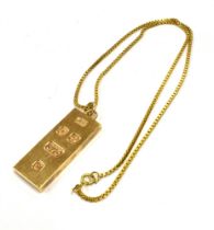 9CT GOLD INGOT PENDANT & CHAIN A gold rectangular ingot pendant, approx 3.9 x 1.6cm, hallmarked