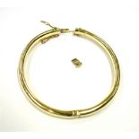 14CT GOLD HINGED BANGLE Plain oval profile, with hinge to one side and push in, tongue style clasp