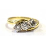 18CT GOLD & THREE STONE DIAMOND RING Three white gold claw settings containing round brilliant