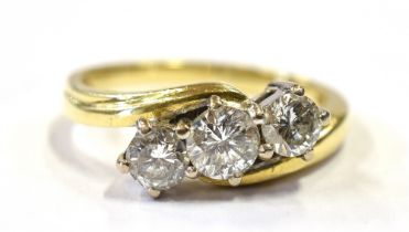 18CT GOLD & THREE STONE DIAMOND RING Three white gold claw settings containing round brilliant